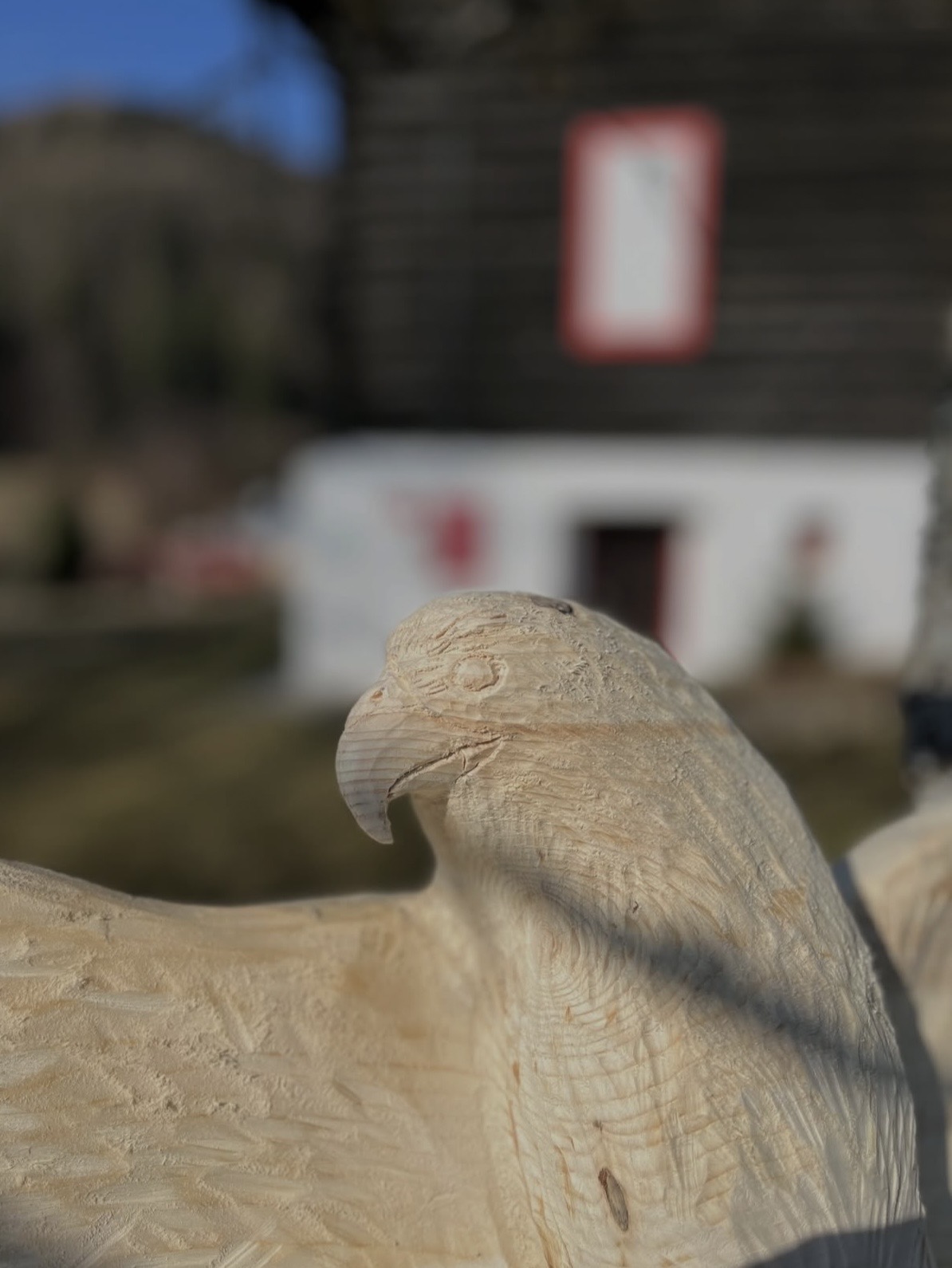 Hand-carved wooden eagle sculpture